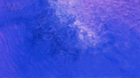 Mixing different colored alcohol inks in a close-up view Stock Footage 342283012