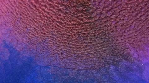 Mixing different colored alcohol inks in a close-up view Stock Footage 342291064