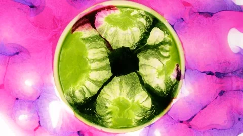 Mixing different colored alcohol inks with epoxy resin in close-up view Stock Footage 342353915