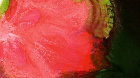 Mixing different colored alcohol inks with a close-up view of blending patterns Stock Footage 342356640