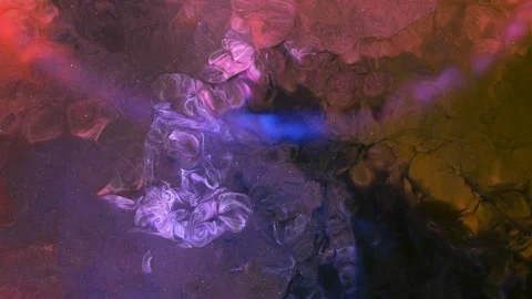 Mixing different colored alcohol inks and epoxy resin in a close-up view Stock Footage 342446099