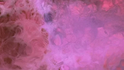 Mixing different colored alcohol inks in a close-up view Stock Footage 342446747