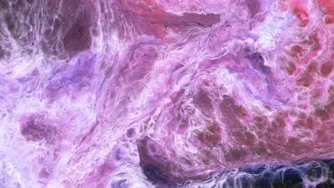 Mixing different colored alcohol inks in a close-up view Stock Footage 342447185