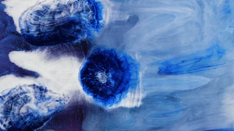 Mixing different colored alcohol inks with epoxy resin in close-up view Stock Footage 342976142