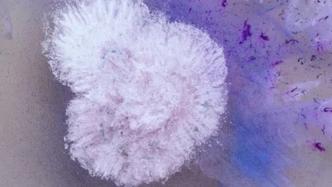 Mixing different colored alcohol inks and epoxy resin in a close-up view Stock Footage 342979615