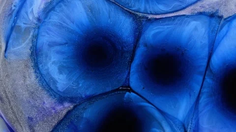 Mixing different colored alcohol inks with epoxy resin in close-up view Stock Footage 342982032