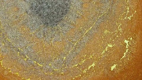 Mixing different colored alcohol inks in macro view at an art studio Stock Footage 347157693