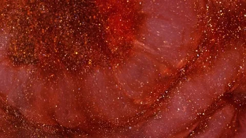 Mixing different colored alcohol inks to create vibrant patterns and textures Stock Footage 347199974