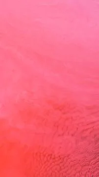 Mixing different colored alcohol inks in a close-up view Stock Illustration