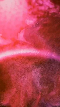Mixing different colored alcohol inks in a close-up view Stock Illustration