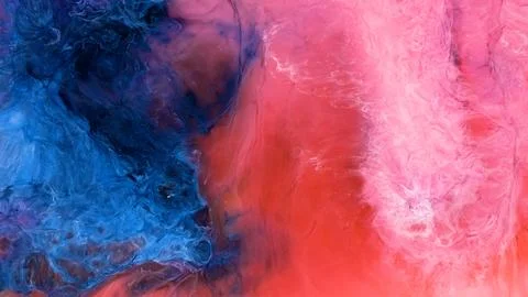 Mixing different colored alcohol inks creates vibrant patterns Stock Photos