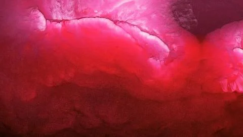 Mixing different colored alcohol inks in a close-up look Stock Photos
