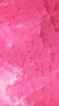 Mixing different colored alcohol inks in close-up view Stock Photos