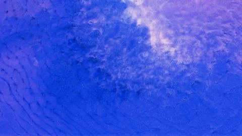 Mixing different colored alcohol inks in close-up view Stock Photos