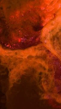 Mixing different colored alcohol inks in a close-up view Stock Photos