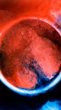 Mixing different colored alcohol inks in close-up view 스톡 사진