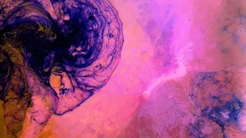 Mixing different colored alcohol inks in a close-up view Stock Photos