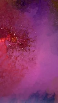 Mixing different colored alcohol inks creates abstract patterns in art Stock Photos