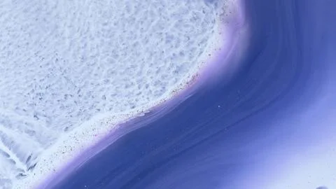 Mixing different colored alcohol inks with epoxy resin close-up Stock Photos