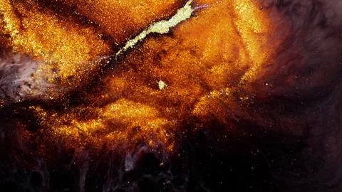 Mixing different colored alcohol inks in a creative process Stock Photos