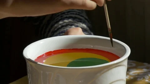 Mixing different colored ink in water Video stock 73573160