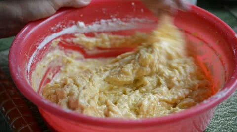 Mixing dough for apple cake Stock Footage 27126566