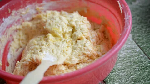 Mixing dough for apple cake Stock Footage 27126646