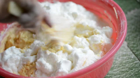 Mixing dough for apple cake Stock Footage 27126729