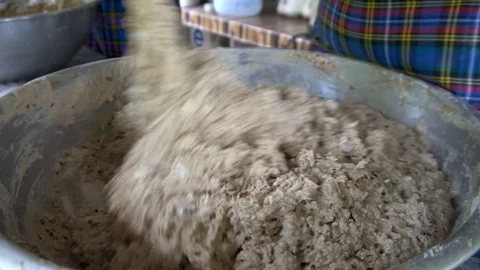 Mixing Dough in Big Metal Bowl Stock Footage
