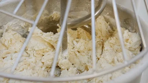 Mixing a dough for bread baking at the manufacturing. Stock Footage 131824874