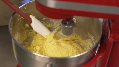 Mixing a dough for bread baking with professional kneader spiral machine. A chef Stock Footage 106251835