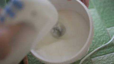 Mixing dough with electrical mixer Video stock 48853966