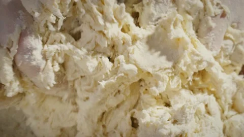 Mixing dough with hands Video stock 138126112