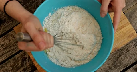 Mixing dough ingredients using hand blender Video stock 130790748