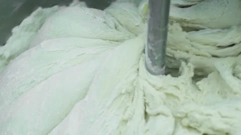 Mixing dough kneading machine at the bakery Stock Footage 150398770