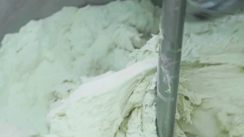 Mixing dough kneading machine at the bakery Stock Footage 150398803