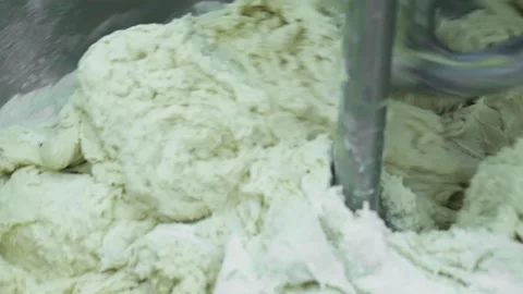 Mixing dough kneading machine at the bakery Stock Footage 150462566