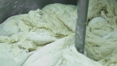 Mixing dough kneading machine at the bakery Stock Footage 150462630