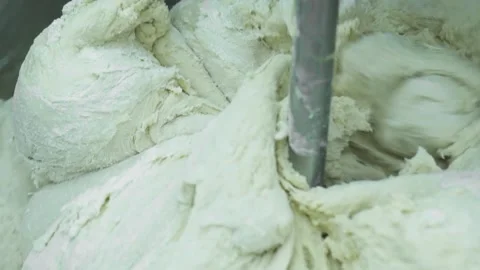 Mixing dough kneading machine at the bakery Stock Footage 150462692