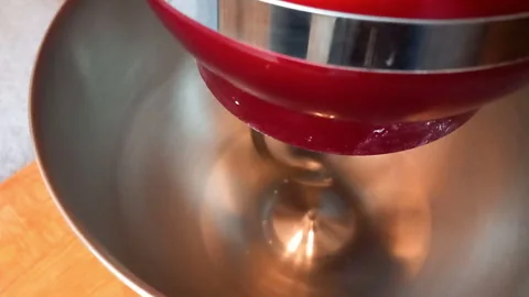 Mixing dough with precision in a kitchen machine during low-speed operation Stock Footage 341317932