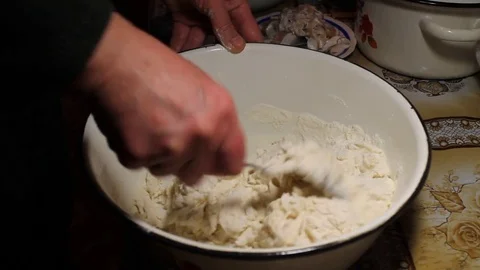 Mixing the dough with a spoon Video stock 76440840