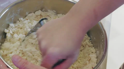Mixing dough using a pastry cutter 4K Stock Footage 48207291