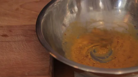 Mixing egg mixture with spices Видео 58856671