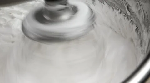 Mixing egg whites and sugar syrup for cooking Macaron Stock Footage 62425556