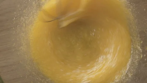 Mixing eggs, beating eggs slow motion 스톡 동영상 124673891