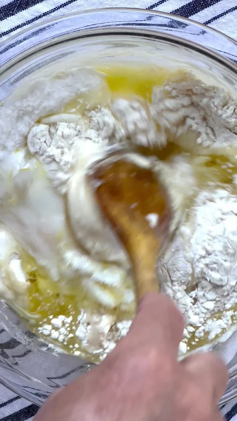 Mixing eggs into cake batter Stock Footage 219514468