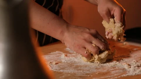 Mixing eggs with flour to make dough Stock Footage 247733759