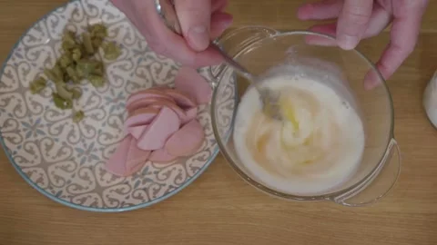 Mixing Eggs for an Omelet or Scrambled Eggs. Preparing a Quick Meal 動画素材 322750838