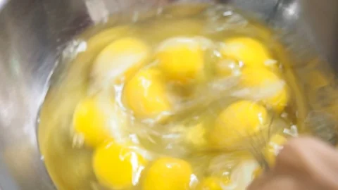 Mixing Eggs in Stainless Balls Video stock 120318765