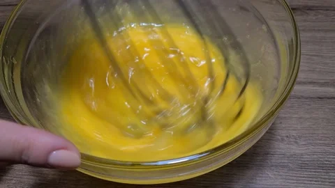 Mixing Eggs With Whisk Stock Footage 164158544